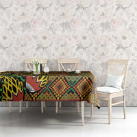 African tribal geometric kanga tablecloth on dining table with chairs, colorful print
