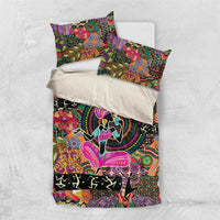 Bedding set with colorful tribal artwork, dancer graphic, and two coordinated pillow shams