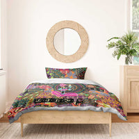 Bedding set with vibrant tribal pattern, circular emblem, and dancer silhouette on dark base