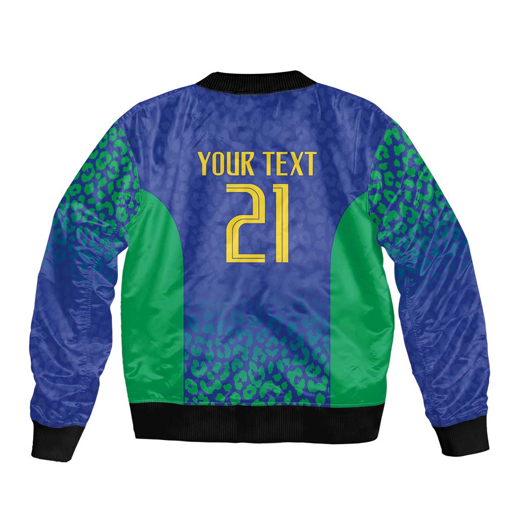 Back of blue and green bomber jacket with YOUR TEXT print, ribbed collar and hem