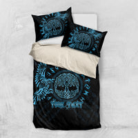 Black and blue bedding set with raven, circular design, and two pillow shams with text