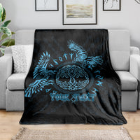 Black couch throw blanket with blue Celtic raven design and customizable text lettering