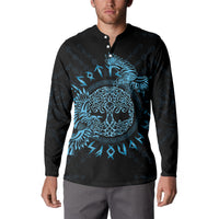 Black button-front sweatshirt with blue raven Celtic design, model wearing
