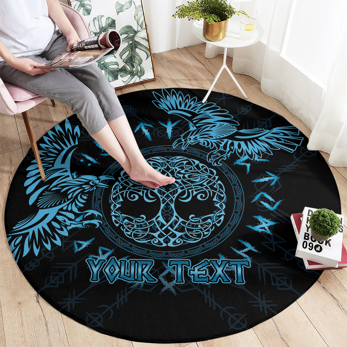Round dark rug featuring a blue Celtic raven, circular knot design, and "YOUR TEXT".
