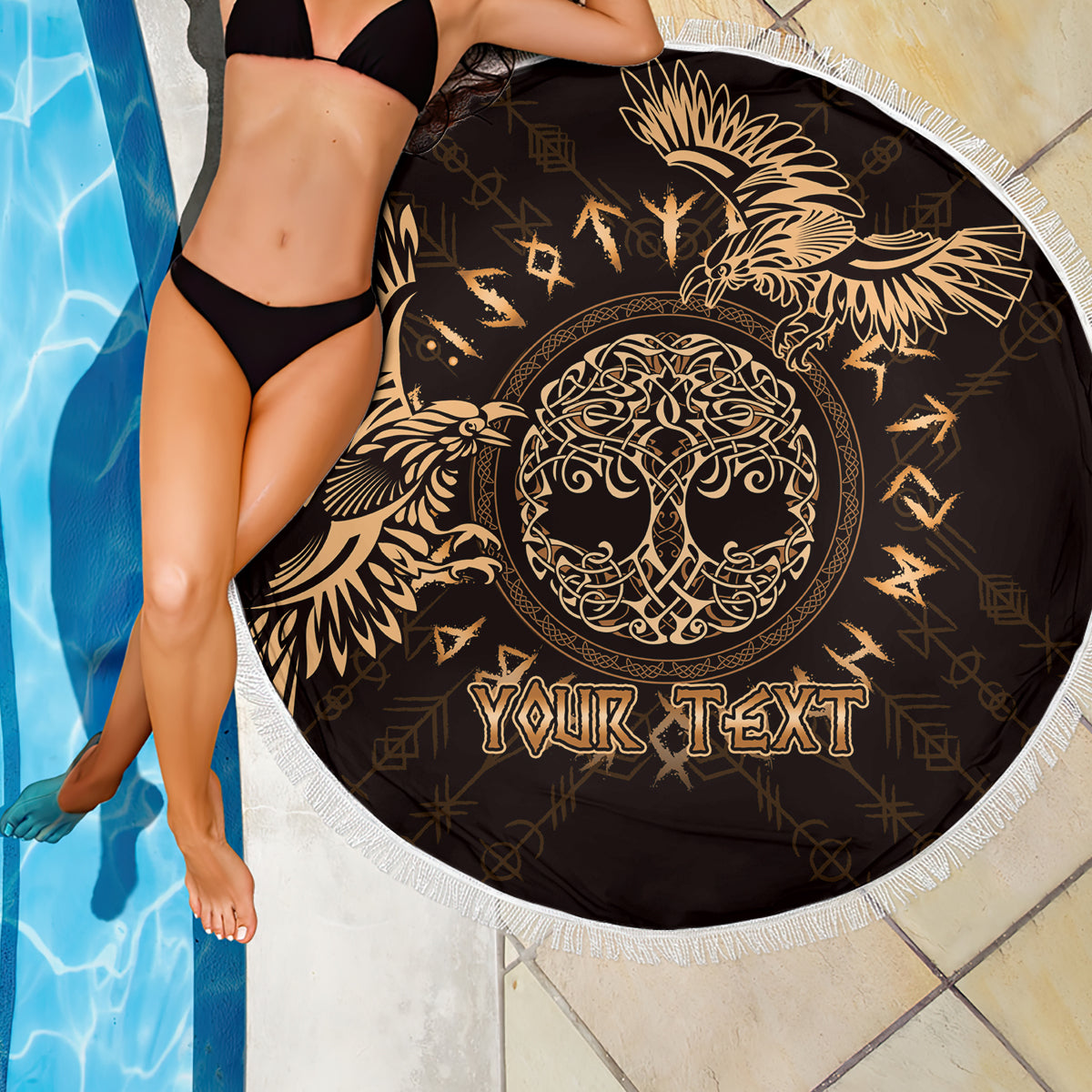 Circular beach blanket in black with gold raven Celtic crest, 'YOUR TEXT' fringe border