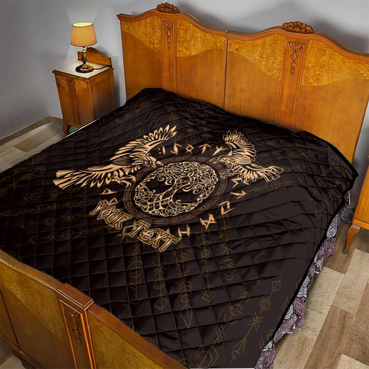 Black quilt on a bed with gold Celtic raven skull design, diamond quilting, 'Your Text'.