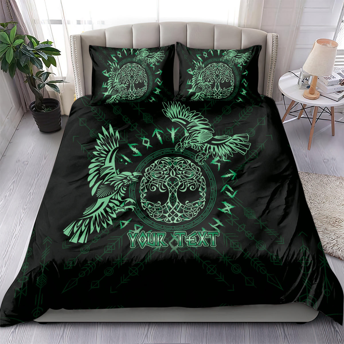 Black duvet cover and two green Celtic raven pillowcases on a bed