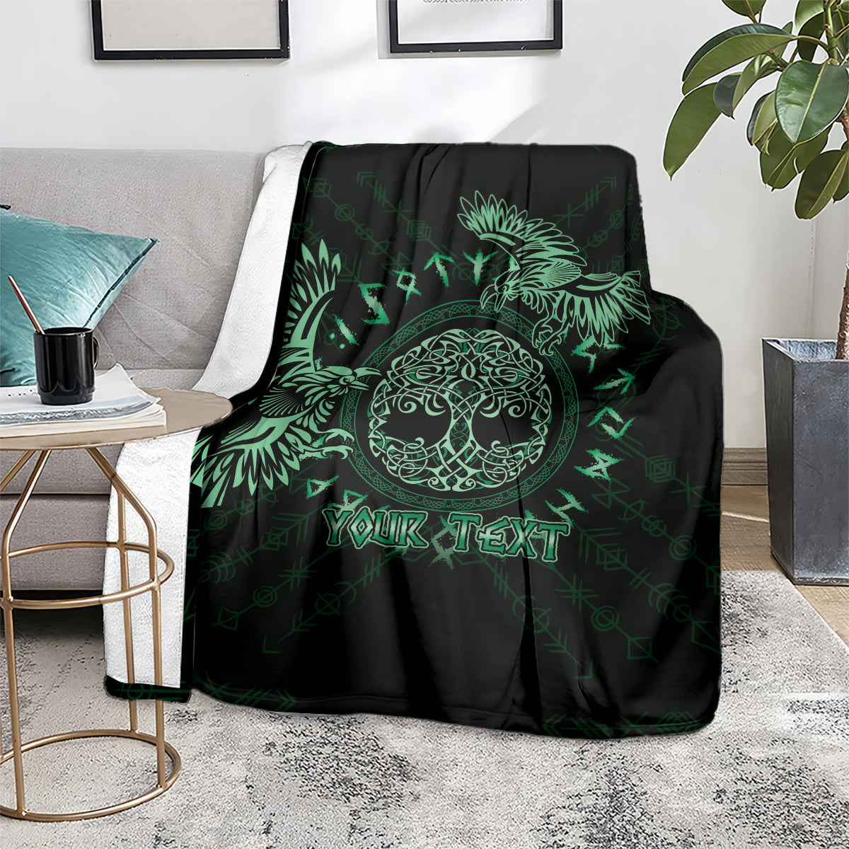 Personalized Odin's Celtic raven blanket on armchair, black with green raven and custom text