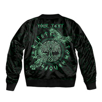 Black bomber jacket with green Celtic raven graphic on back, ribbed collar and cuffs