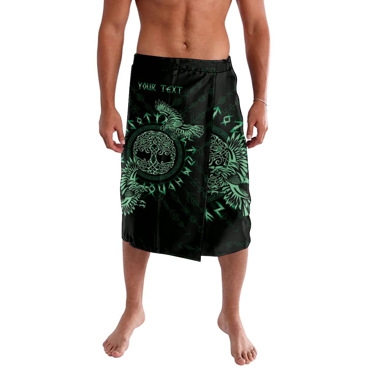 Green and black graphic lavalava with elastic waist, raven celtic print and 'YOUR TEXT'.