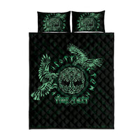 Black quilt bed set with green raven motif and 'YOUR TEXT' panel; two pillows