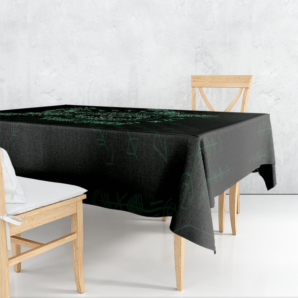 Rectangular tablecloth, black with green Celtic rune pattern and draped corner edge