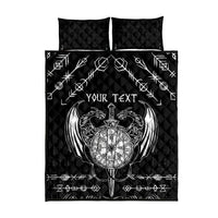 Black quilt set with two pillows and centered white emblem, geometric rune linework