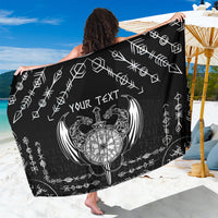 Black sarong with white Norse-style print and center 'YOUR TEXT' graphic, draped