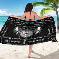 Black sarong with white Norse-style print and 'YOUR TEXT' center design, worn wrap