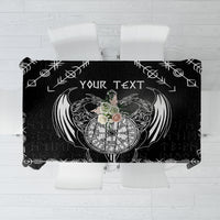 Black tablecloth with white Viking dragon and sword graphic centerpiece.