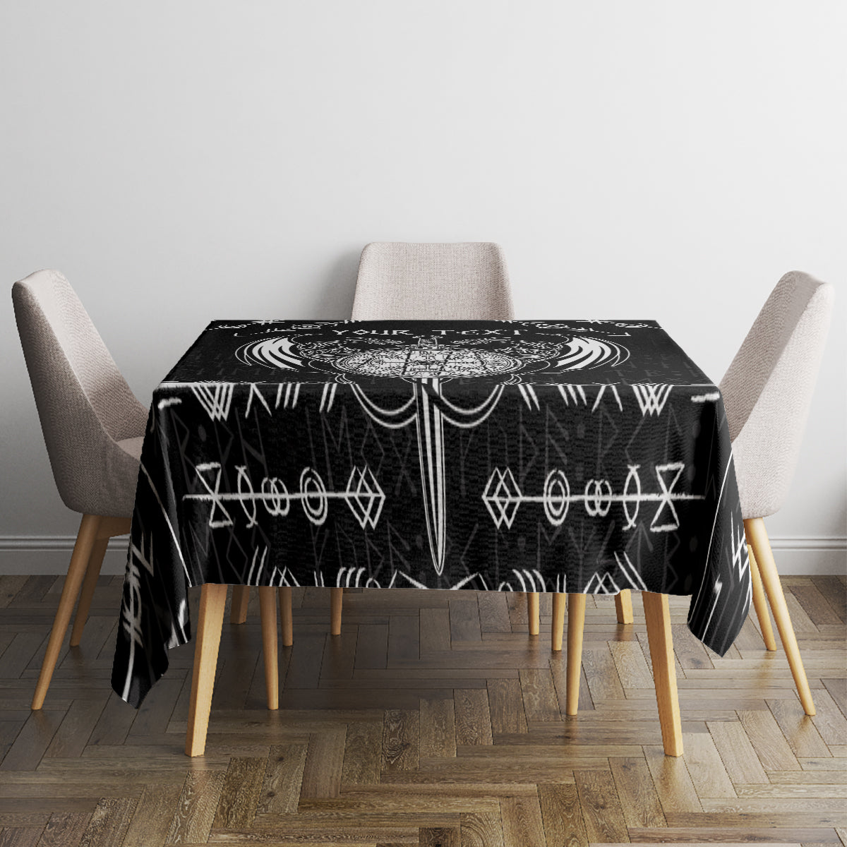 Black tablecloth with white Viking symbol border design on top surface.