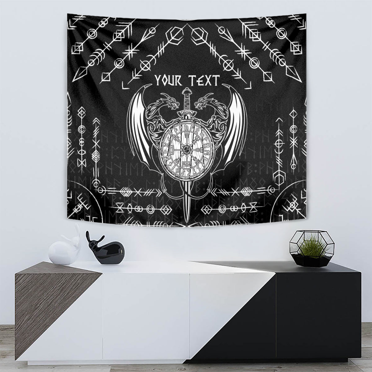 Black wall hanging tapestry with white Viking dragon compass emblem and 'Your Text' text