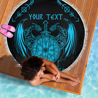 Round beach blanket showing blue Viking compass dragon design with custom text area and fringe