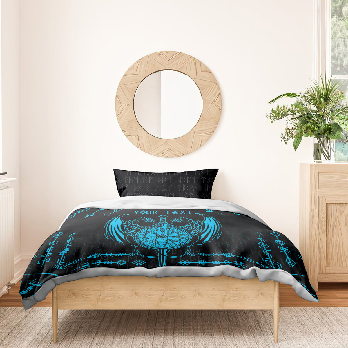Black duvet with large blue Viking dragon emblem and rune lines, with black pillowcases