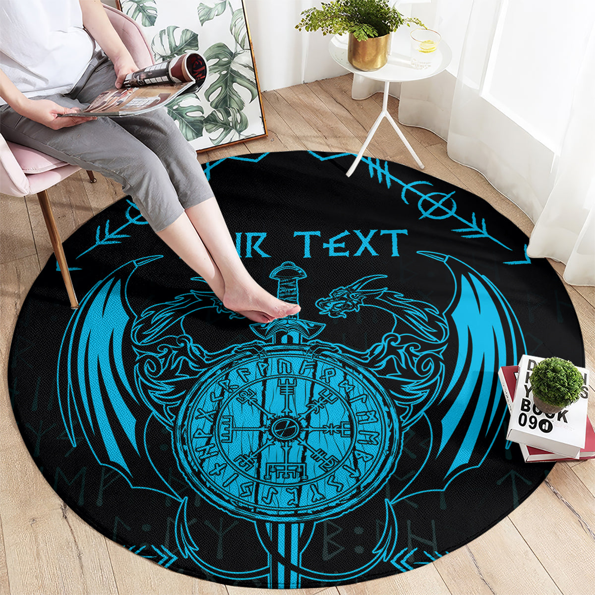Round rug underfoot with blue Viking dragon, sword, compass emblem and custom text