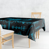 Blue and black Viking dragon tablecloth with rune symbols draped over table edges