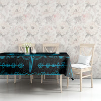 Blue and black Viking dragon tablecloth with rune symbols on a rectangular table