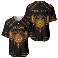Two-view black baseball jerseys with gold dragon crest; one shows 'DRAGON', other 'YOUR TEXT'