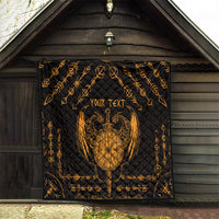 Black quilt with gold Viking dragon shield and sword tattoo, personalized text on outdoor wall