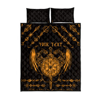 Black quilt bed set with gold Viking dragon and compass medallion, two pillows