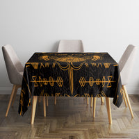 Black tablecloth with gold Viking dragon and runic symbols on dining table