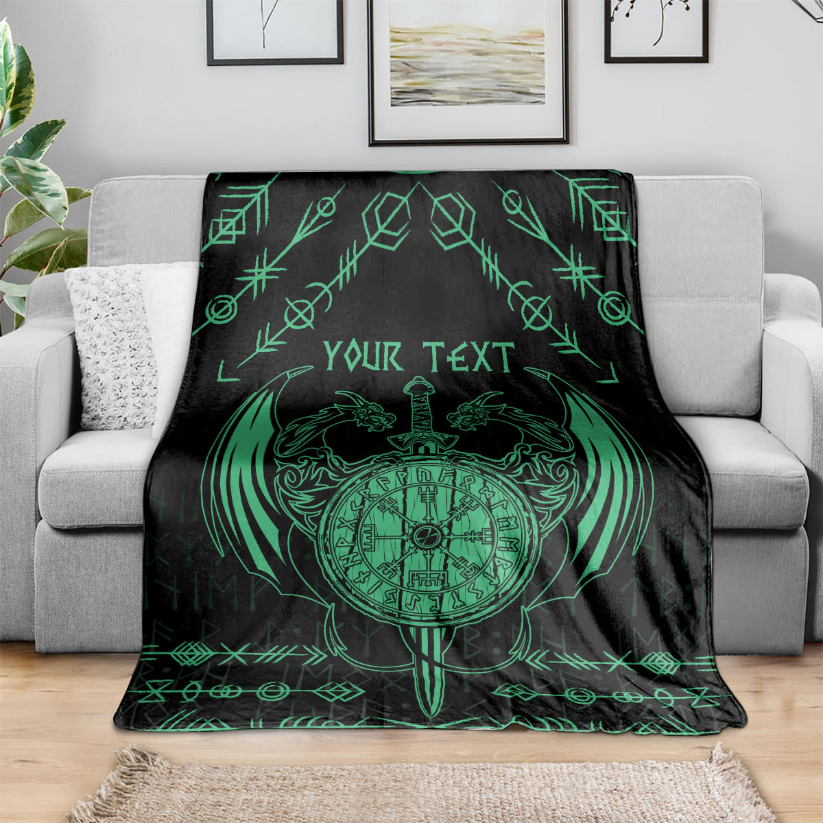 Black Viking dragon throw blanket with green compass-heart emblem and border symbols