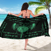 Green-and-black Viking dragon sarong draped with geometric and dragon clock design