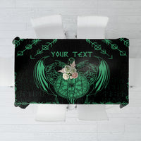 Black tablecloth with green Viking dragon and circular rune emblem, sword-like design