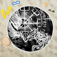 Round black beach blanket with white raven and wolf symbols, fringed edge