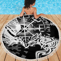 Round black beach blanket with raven and wolf graphic, fringed edge