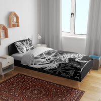 Black bedding set with white raven and rune artwork, with matching pillowcases