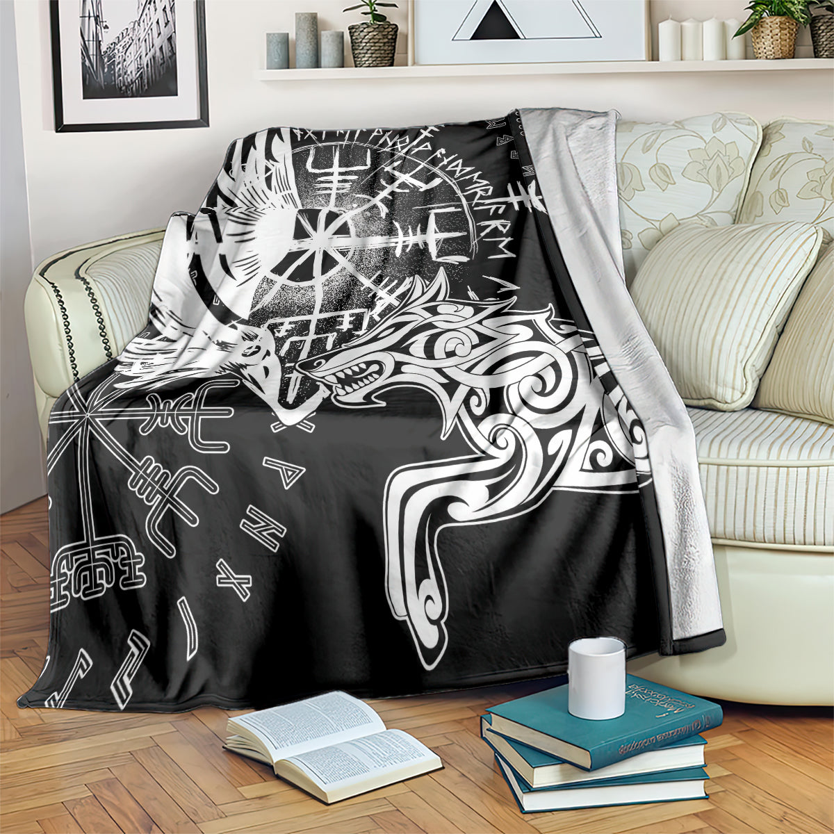 Black blanket with white raven, wolf, and rune-style emblem
