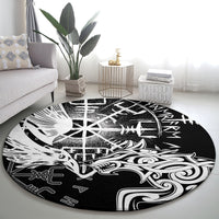 Round black area rug featuring white Viking raven, wolf, and rune pattern