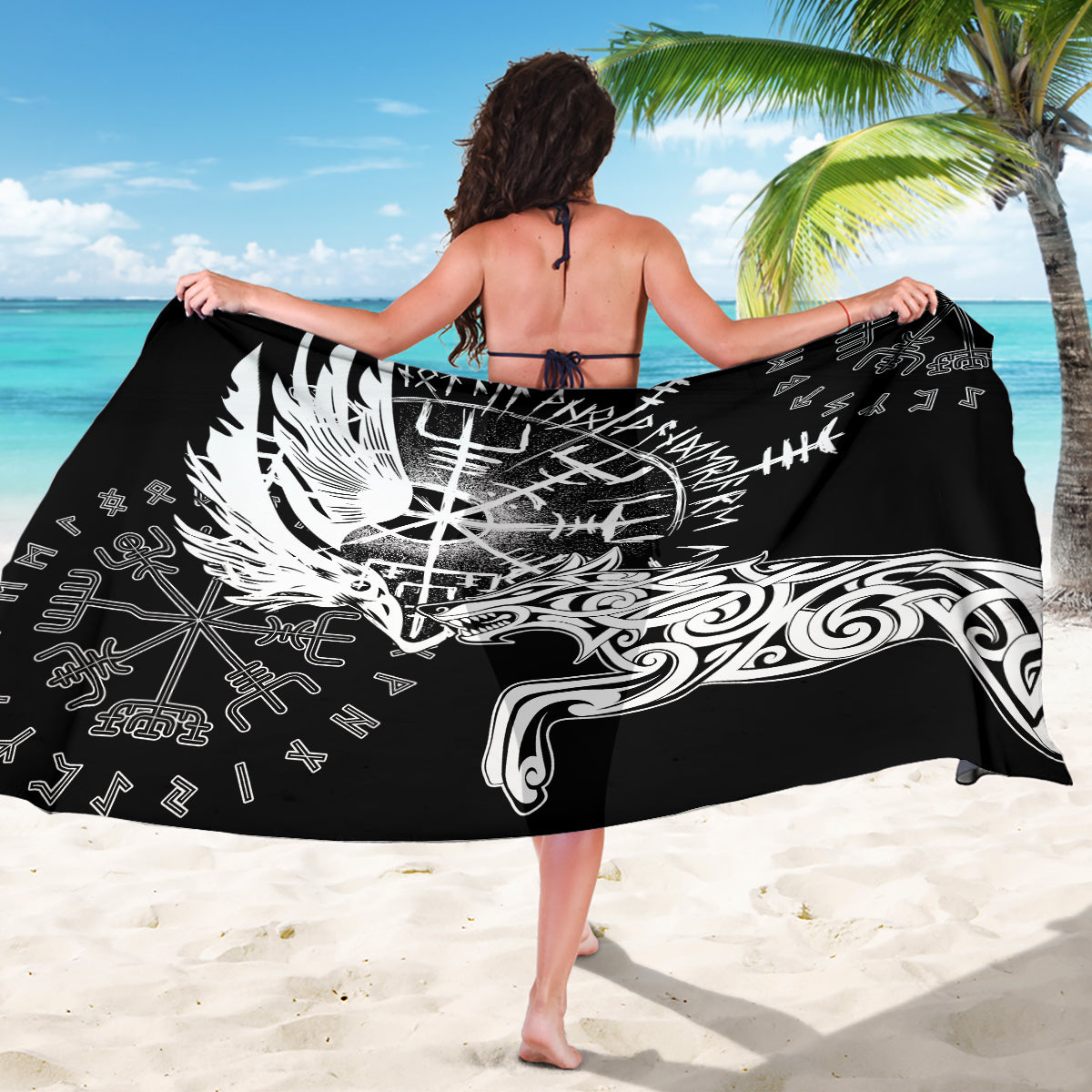 Black Viking sarong draped wide, showing white raven and wolf design with runes
