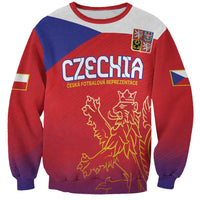 Red sweatshirt with lion graphic, Czech flag patch, and blue/yellow stripes