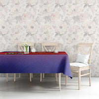 Red and blue tablecloth with Czech lion emblem on rectangular dining table