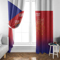 Blue and red Czech lion window curtain panels beside a white door