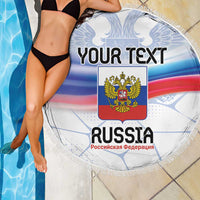 Round Russia flag beach blanket with fringe, 'YOUR TEXT' and crest, draped on model
