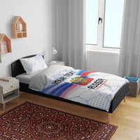 Bedding set on bed with Russia flag colors, eagle emblem, and custom text on duvet