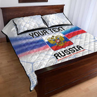Russia flag-style quilt bed set with emblem panel and two matching pillows on wooden bed