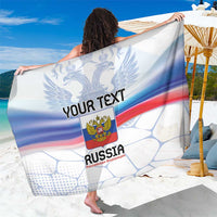 White sarong with large double-headed eagle emblem and blue-red ribbon flag stripes