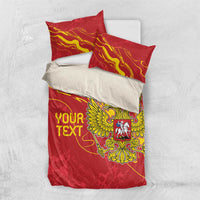 Red bedding set with two pillowcases and duvet showing “YOUR TEXT” and eagle crest