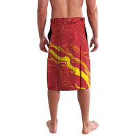 Red flag-print lavalava with yellow curved lines and darker abstract accents