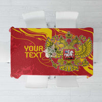 Red tablecloth with gold double-headed eagle crest design